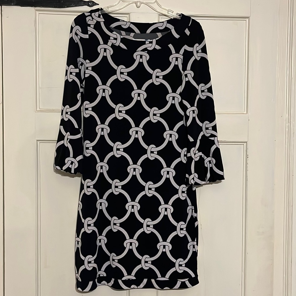 White House Black market brand dress. Black with white chain-link design print.